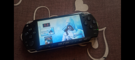 Sony PSP 2000 (PSP-2001) + комплект ігор, адаптер 4