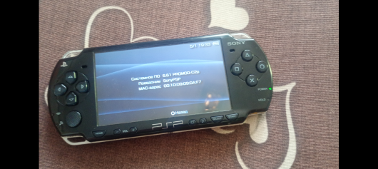 Sony PSP 2000 (PSP-2001) + комплект ігор, адаптер 5