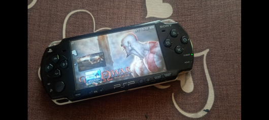 Sony PSP 2000 (PSP-2001) + комплект ігор, адаптер 3