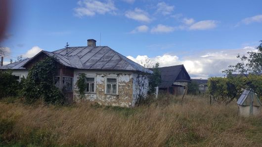 Земельна ділянка з будинком 1