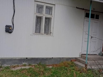 Половина житлового будинку