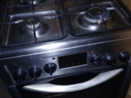 Газова плита з електричною духовкою.Б/в.